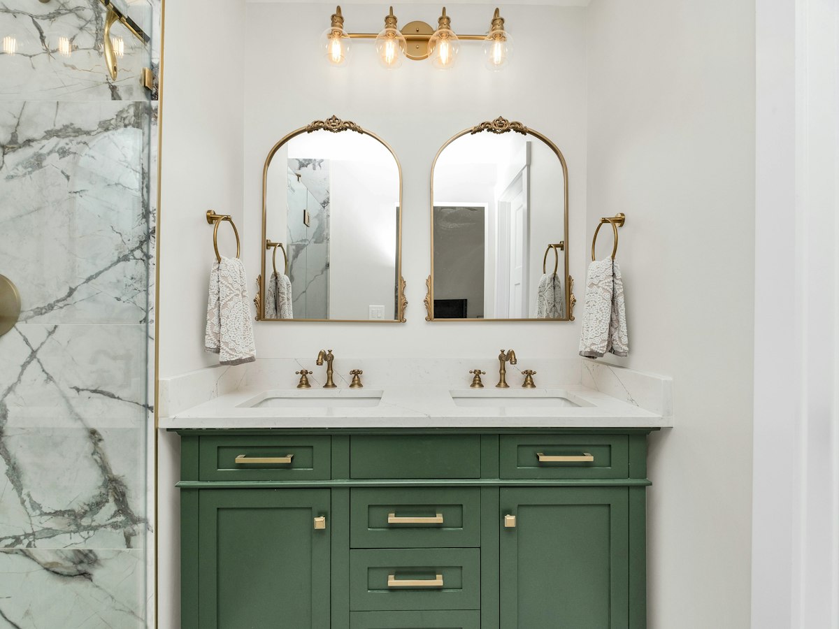Finished bathroom with marble counters after a full repipe