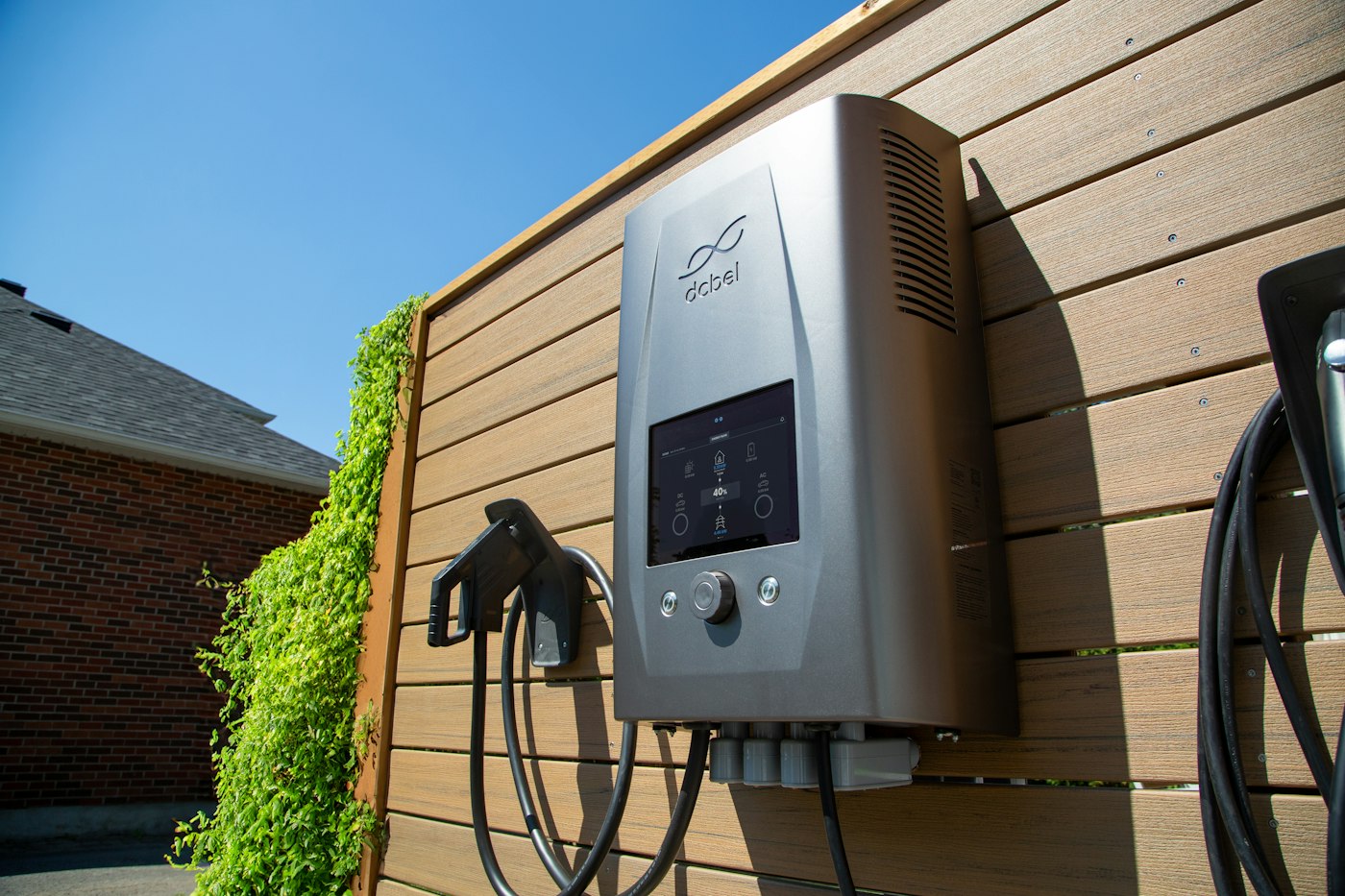 A modern Level 2 EV charger installed by Brightwire Electric